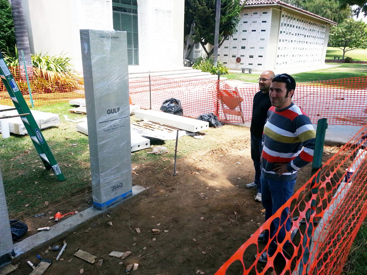 Designer Danny Welch surveys the progress of a new war memorial at Woodlawn Cemetery on Thursday. The memorial will be unveiled today during the cemetery's annual Memorial Day Observance. (Daniel Archuleta daniela@www.smdp.com)