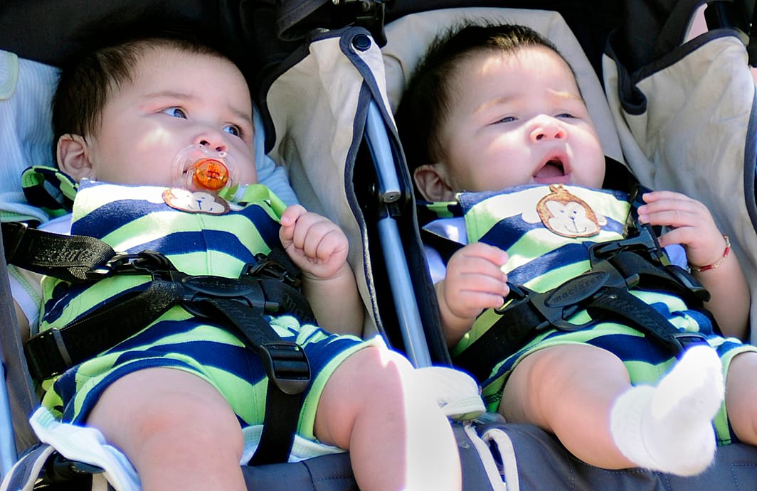 File photo DOUBLE TROUBLE: Two babies wear identical outfits as they take a stroll on the Santa Monica Pier. (File photo)