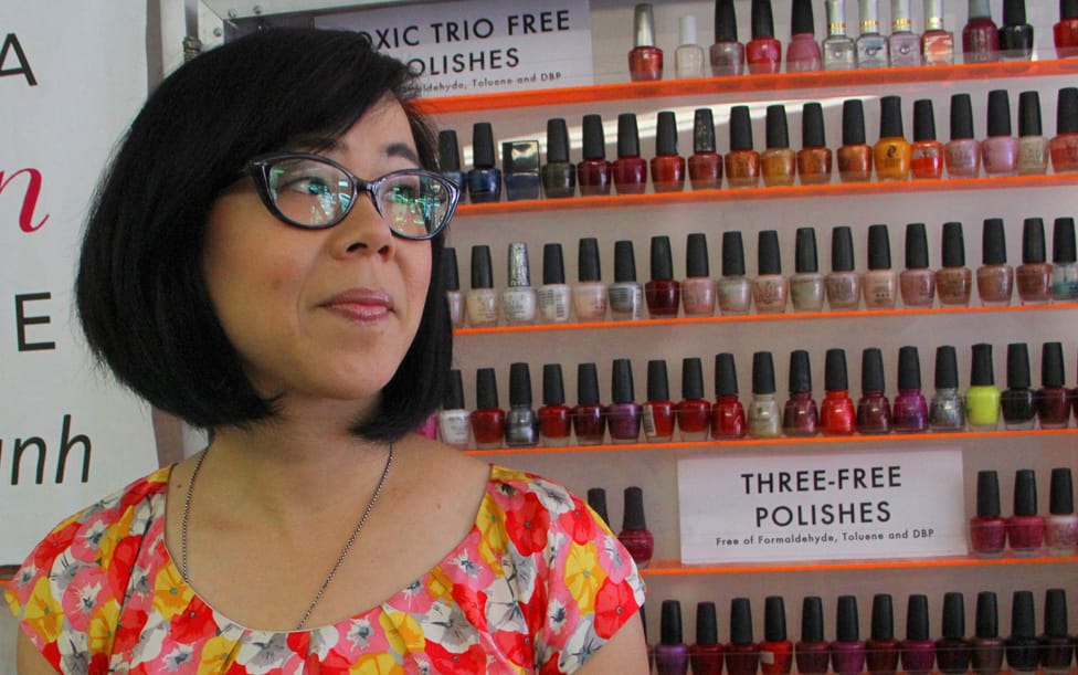 COLORFUL: Candice Kim, with the Coalition for Clean Air, stands in front of a display of non-toxic nail polish at Cute Nails on Tuesday. The coalition was on hand for the kick-off of the Healthy Nail Salon Program co-sponsored by Santa Monica's Office of Sustainability and the Environment. (Photo by Daniel Archuleta)