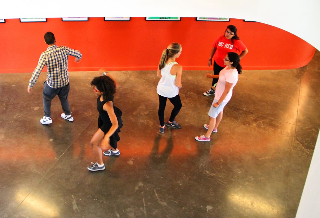 KIDS IN MOTION: New Roads students practice dance in the lobby of the new Capshaw-Spielberg Center for Arts and Educational Justice last week. The students are working with nonprofit dance group Contra Tiempo. (Daniel Archuleta daniela@www.smdp.com)