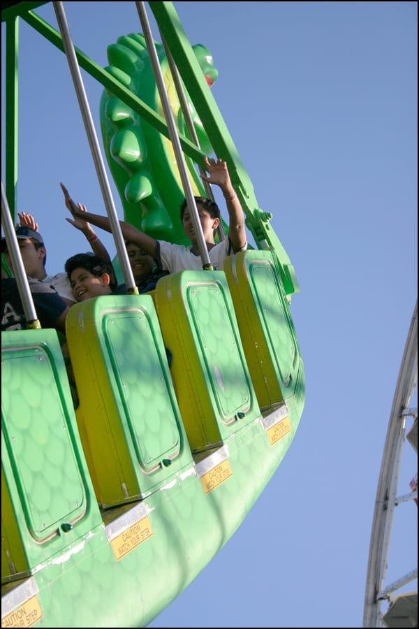 Members of the Santa Monica Police Activities League ride the Sea Dragon Wednesday at Pacific Park.  (File photo)