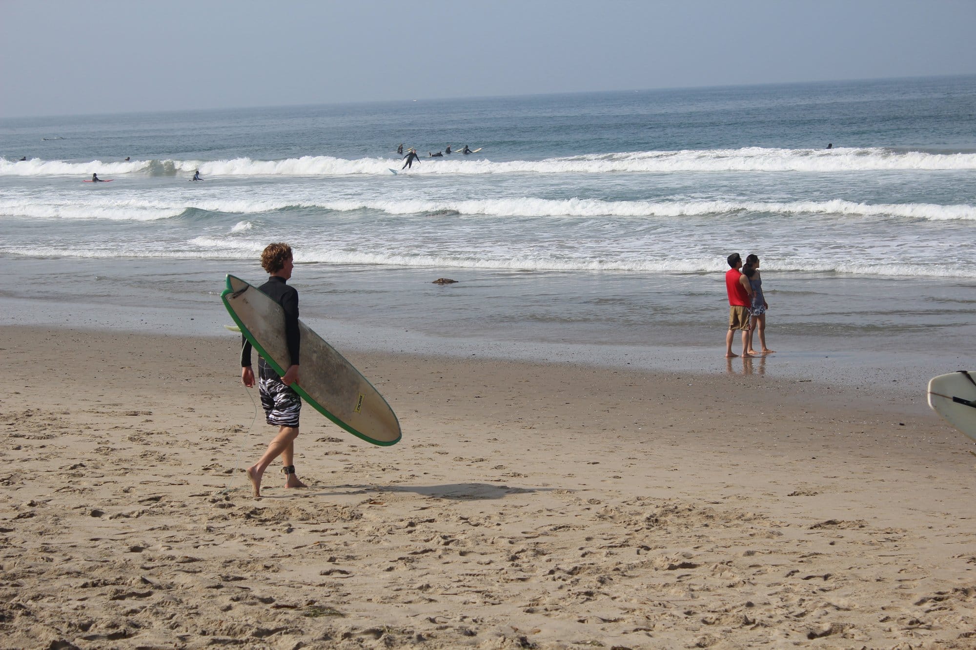 Matt King, communications director for Santa Monica-based Heal the Bay, as he heads out for a recent surfing session, during which he believes he spotted a young great white shark swimming in the Santa Monica Bay. (Photo courtesy Matt King)