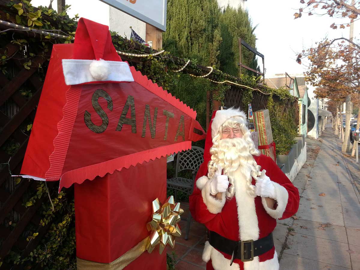 DUDE IN RED: Santa Claus will be on Pico Boulevard Saturday to spread some holiday cheer at the annual Winter Holiday Art Walk. (Photo courtesy Pico Improvement Organization)