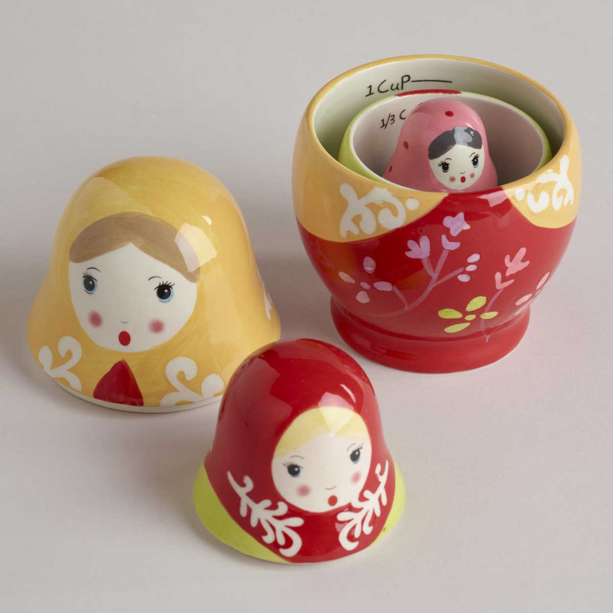 Decorative measuring cups can make for great gifts for the chef in your family. Stackable ones can also be used to serve sauces or condiments. (Photo courtesy www.worldmarket.com)