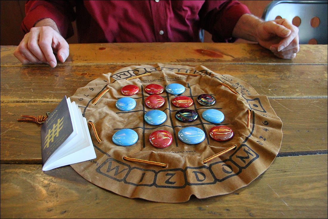 Stewart Lamle demonstrates his game dubbed Wizdom. (Photo by Daniel Archuleta)