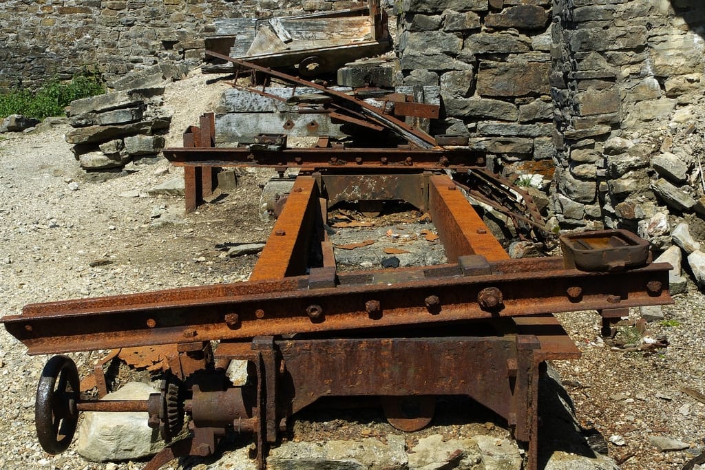 Unsafe levels of lead contaminate soil in hundreds of neighborhoods around the U.S. where lead smelting facilities operated between the 1930s and 1960s. Children under the age of six are especially vulnerable to lead poisoning, which can severely affect mental and physical development. Pictured: Rusty remains at an old lead smelting mill. (Photo courtesy Simon Bowen)