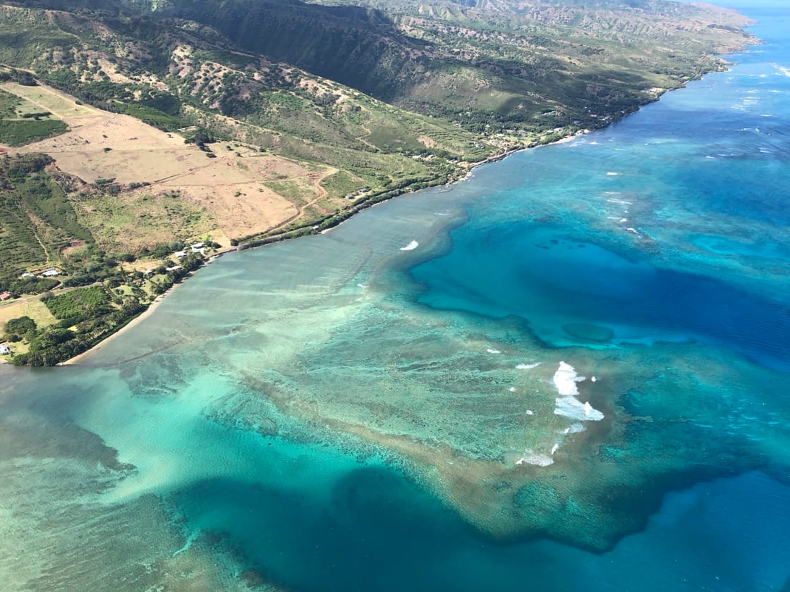 Aerial view of a blue lagoon and island