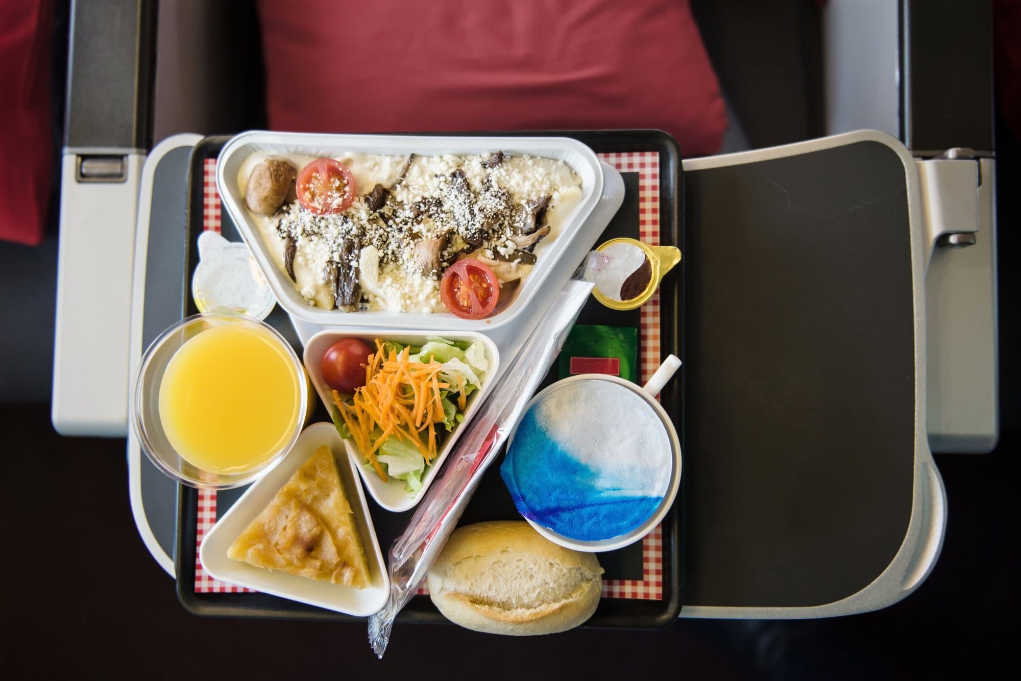 Airplane Meal with Pasta Salad and Bread Roll