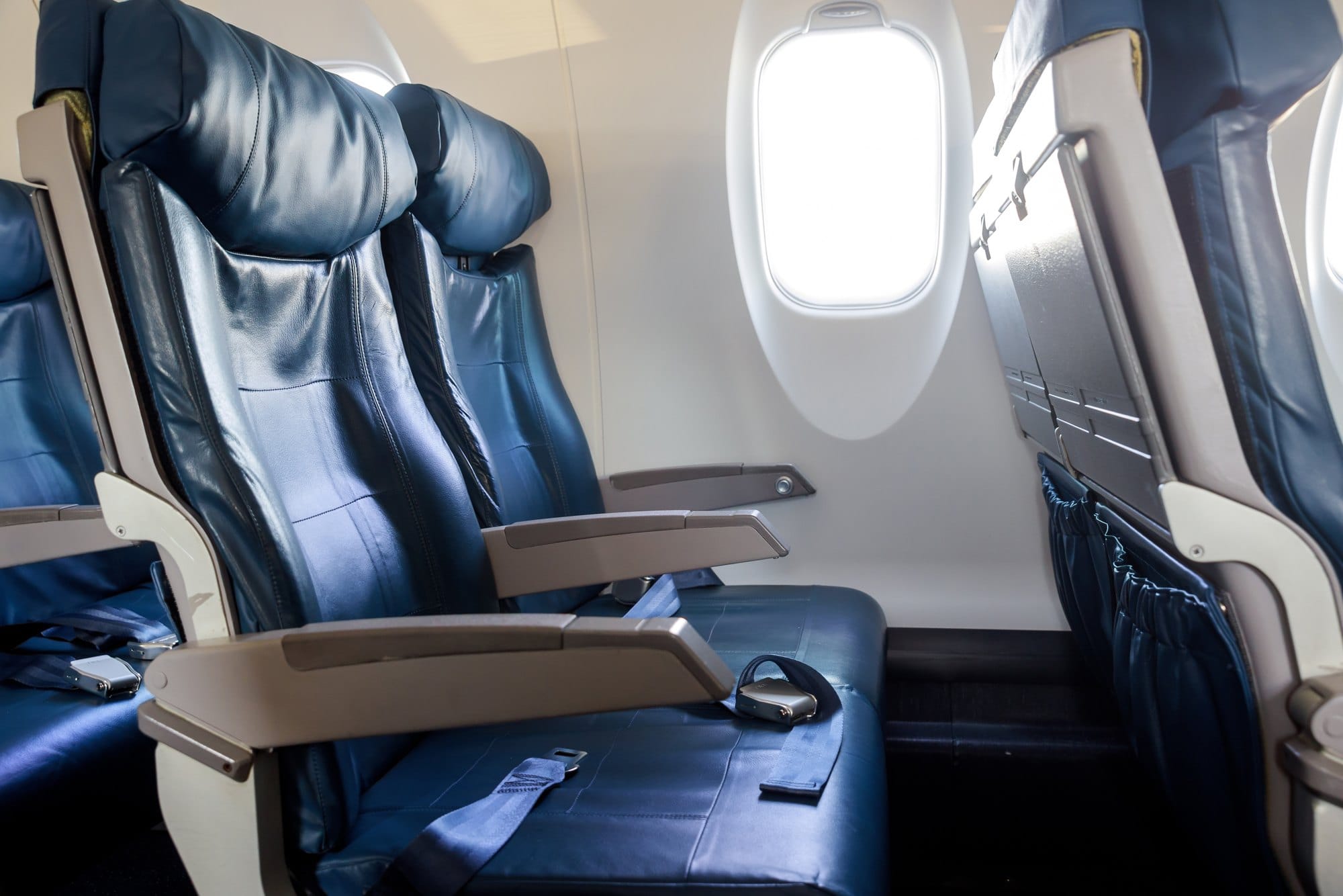 Airplane Seats and Bright Window Inside Aircraft