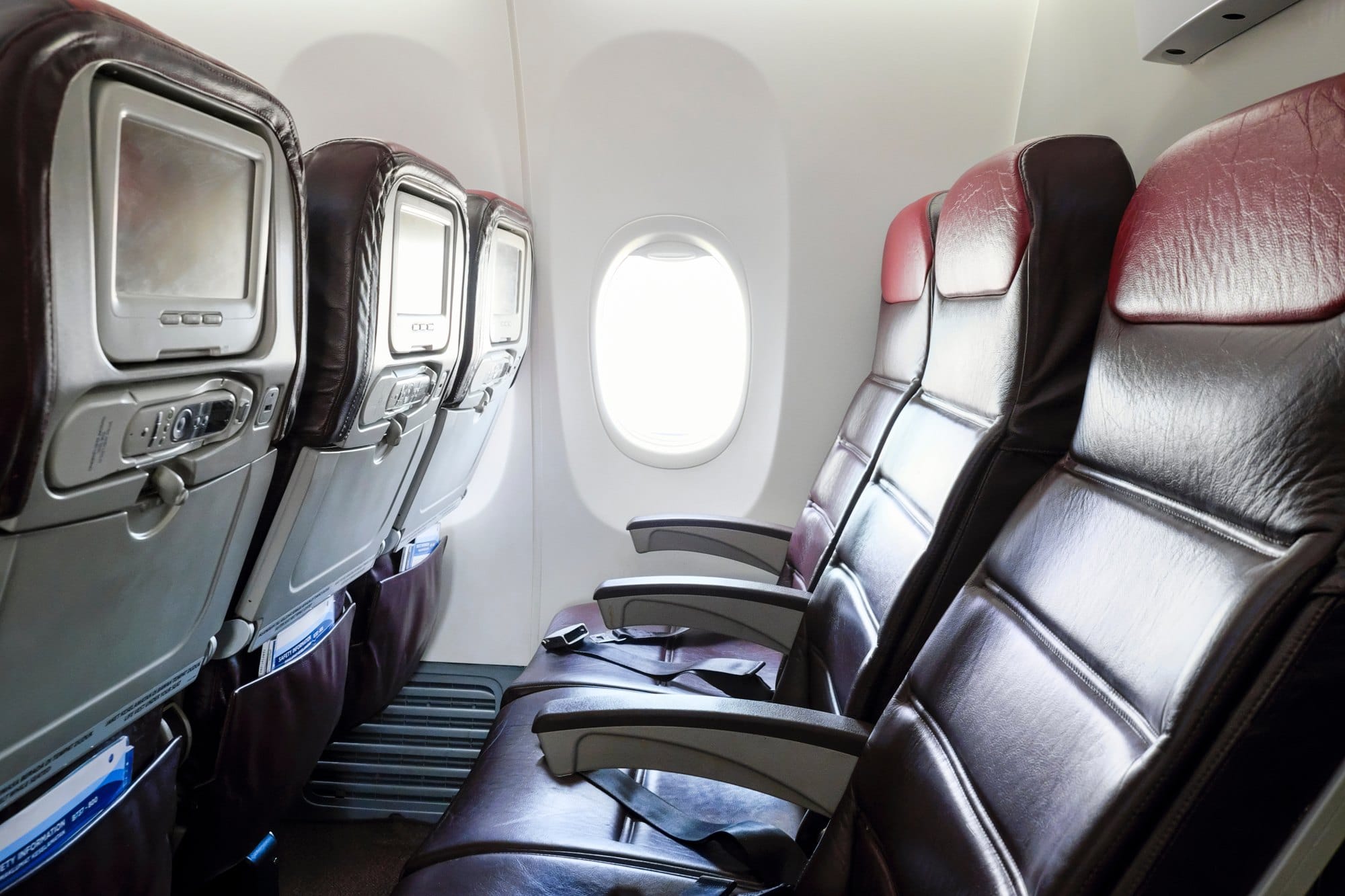 Airplane Seats and Window with Bright Light