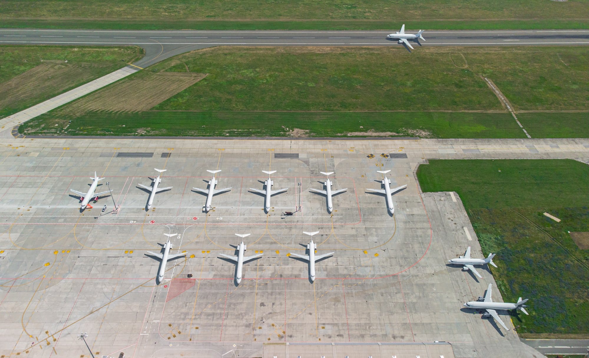 Airport with airplanes, aerial view