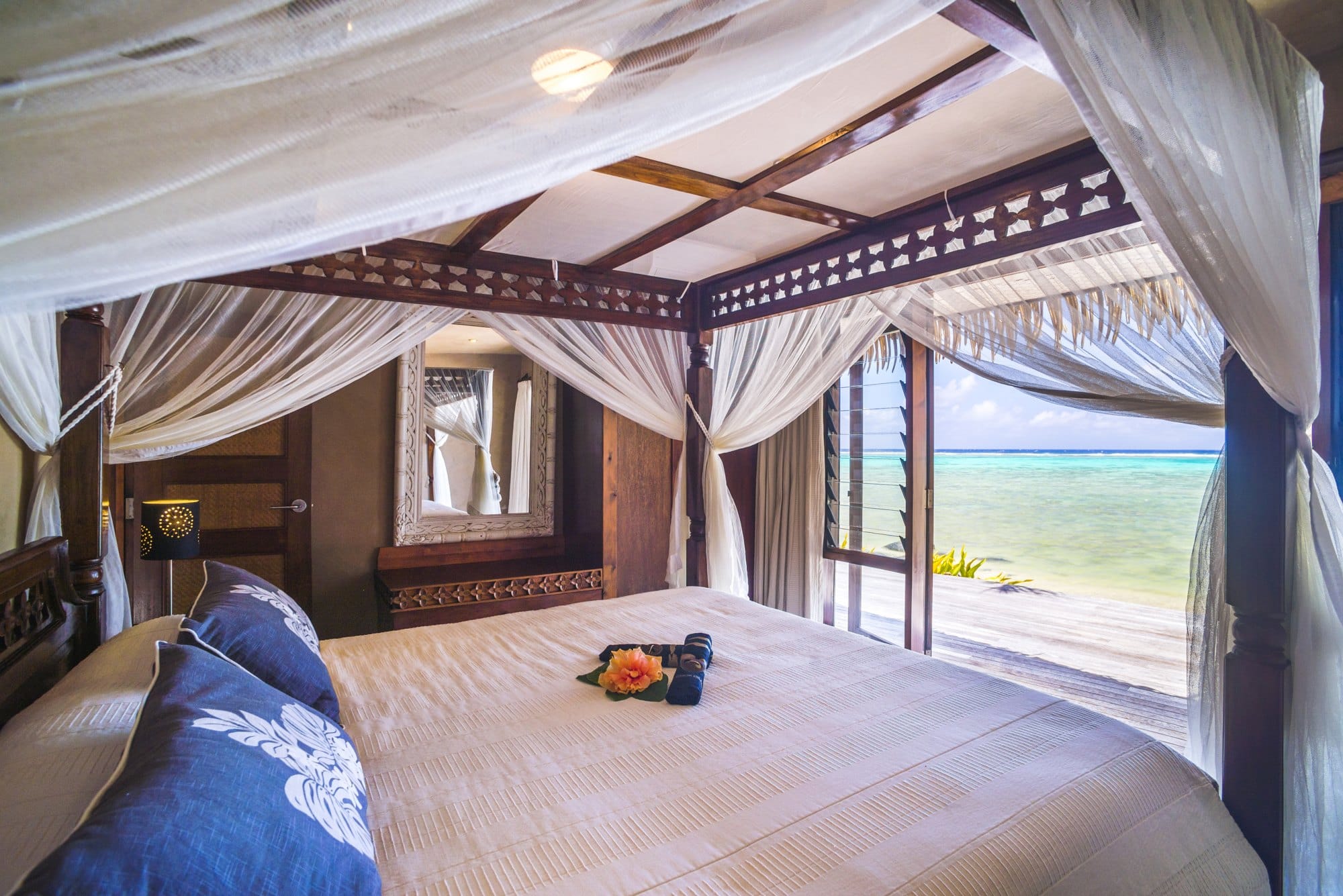 Bedroom with sea view over the tropical Pacific Ocean at luxury hotel accommodation, Muri, Rarotonga