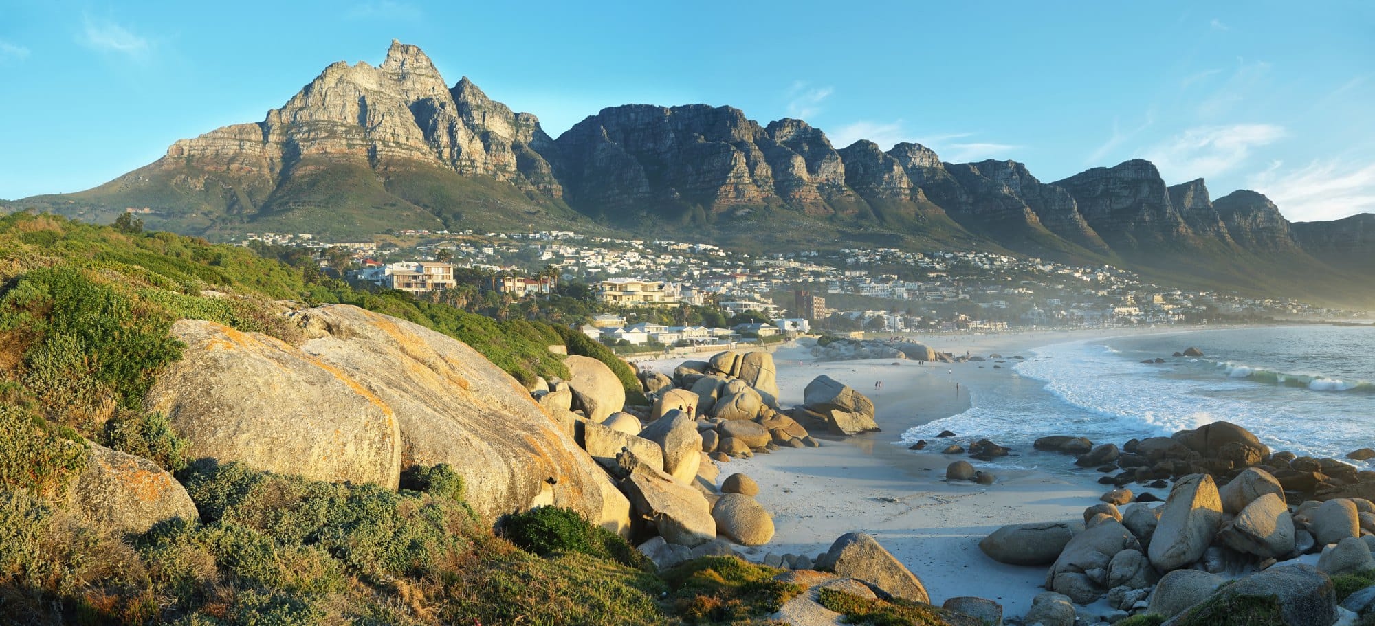 Camps Bay Beach in Cape Town, South Africa, with the Twelve Apostles in the background