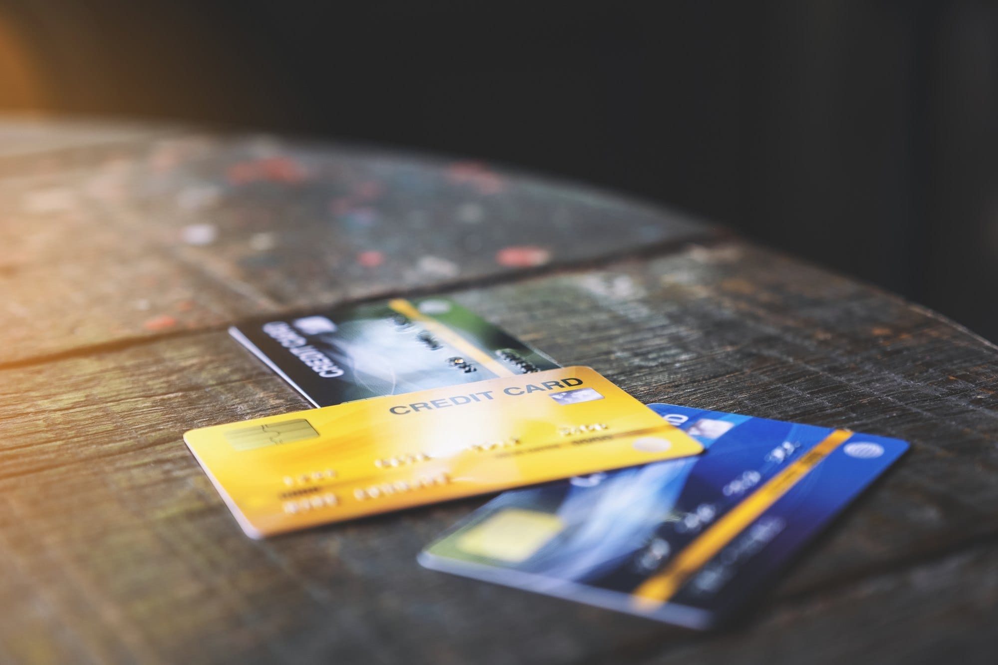 Credit Cards on Wooden Table Close Up