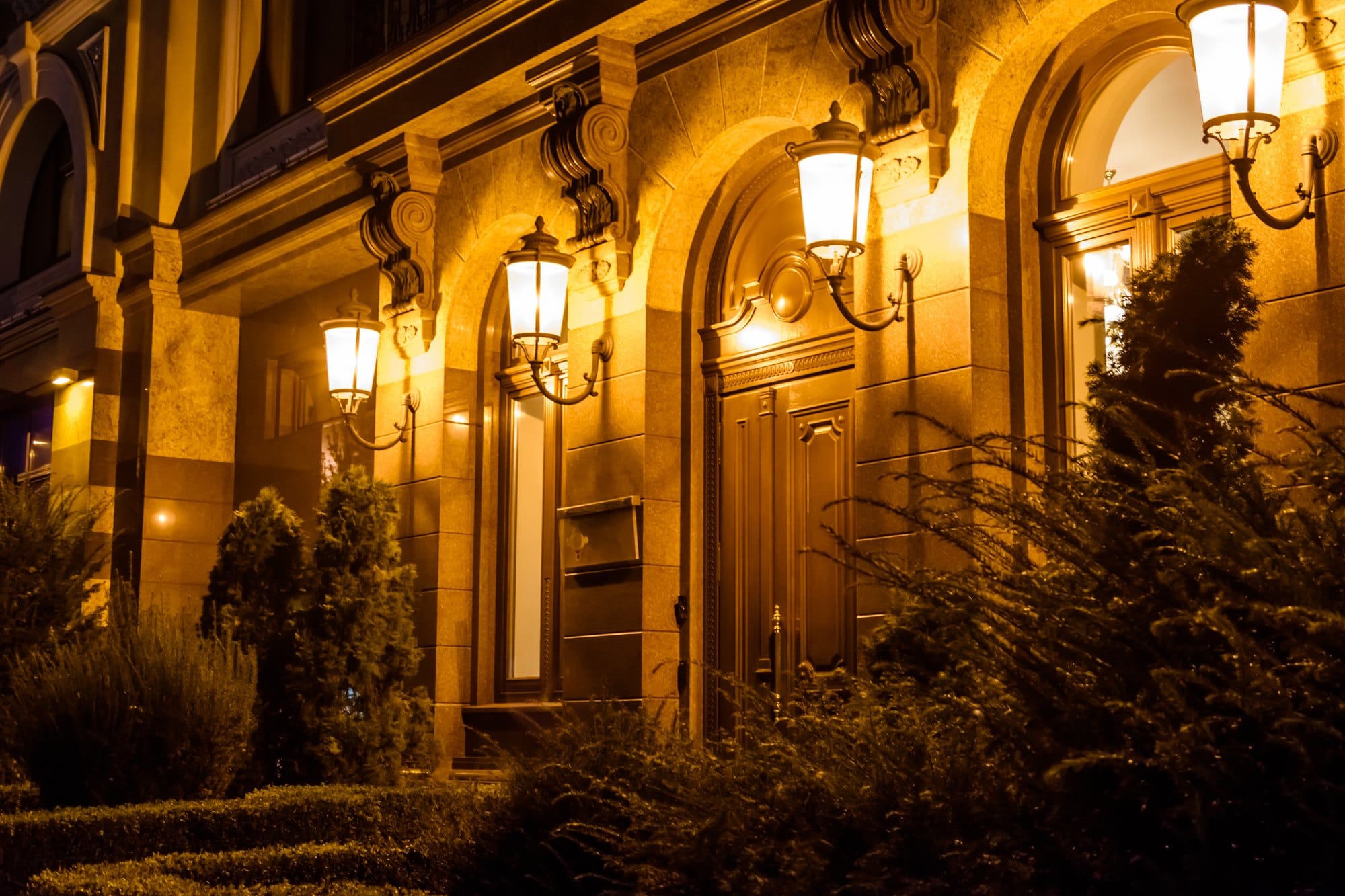 Exterior Building with Arched Doorways and Night Lights