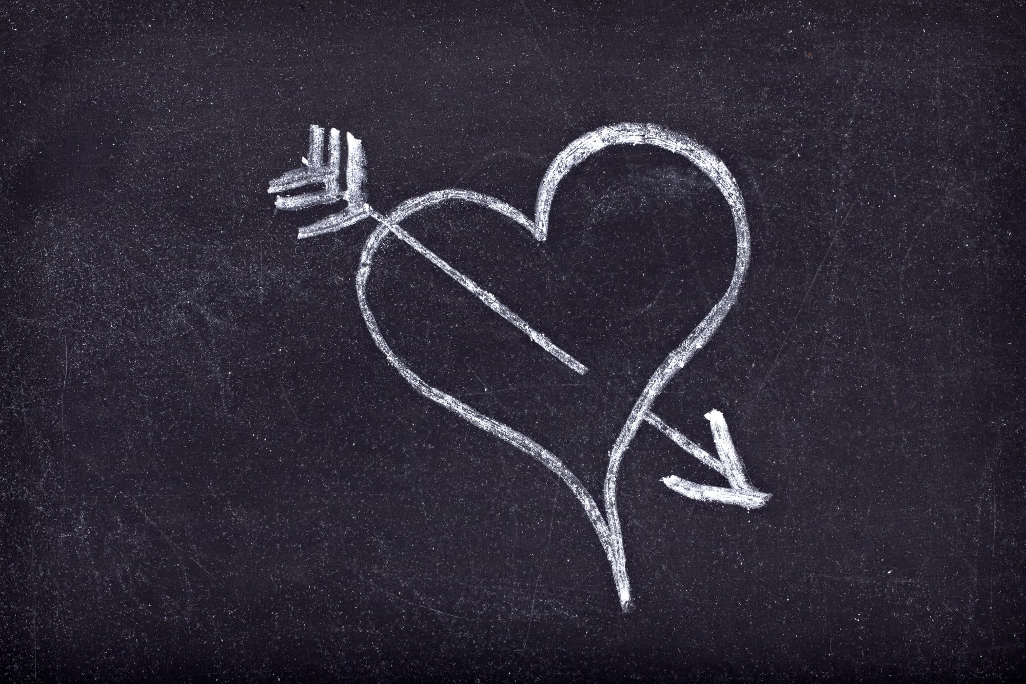 Heart and Arrow Chalk Drawing on Blackboard