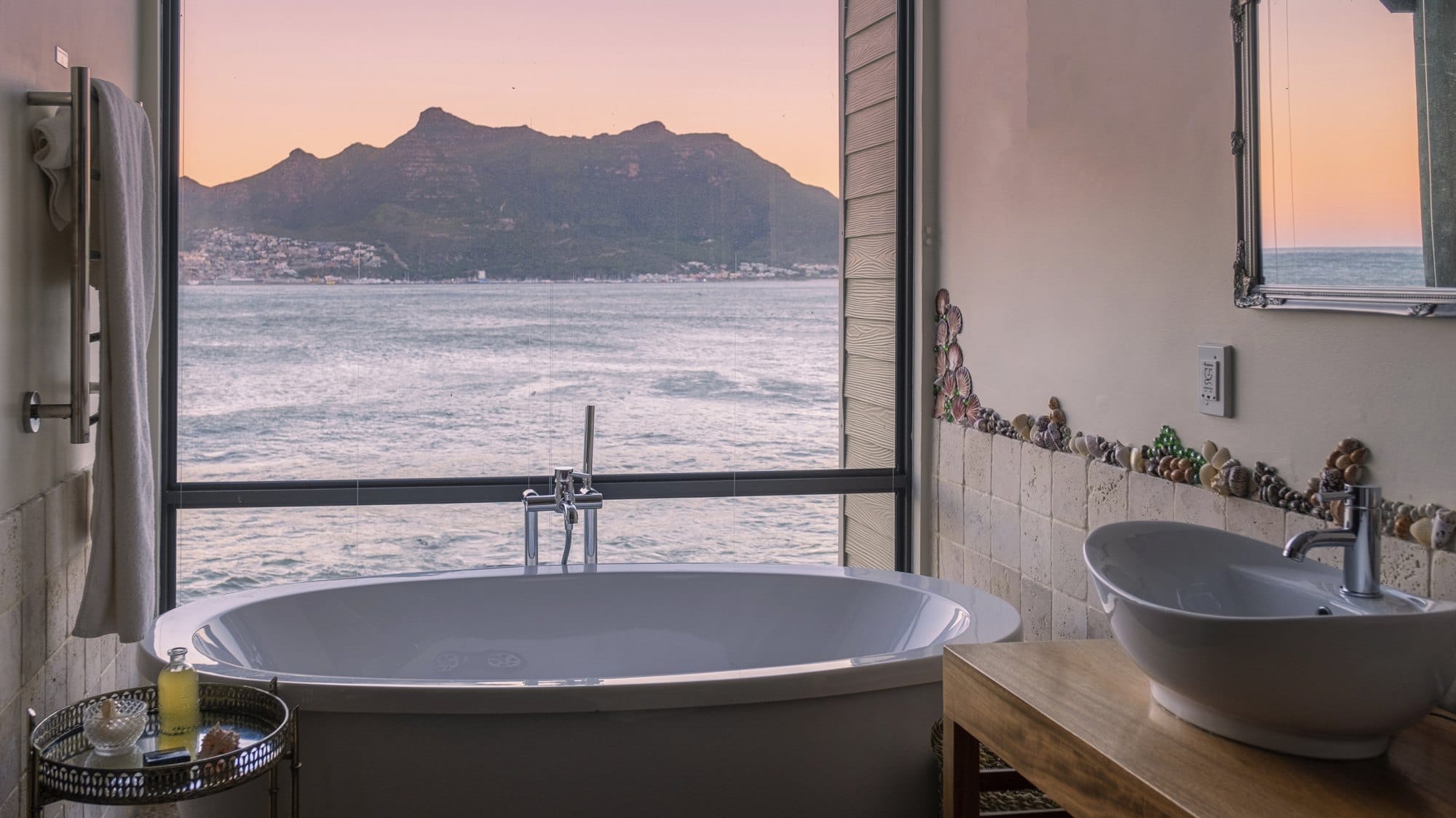 Luxury Bathroom with Ocean View at Sunrise