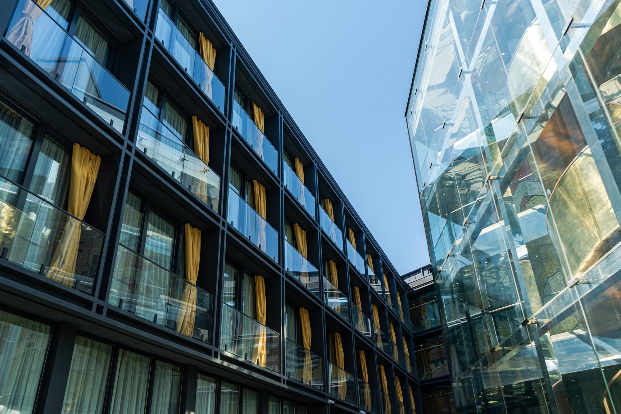 Modern Architecture with Glass Facades and Balconies