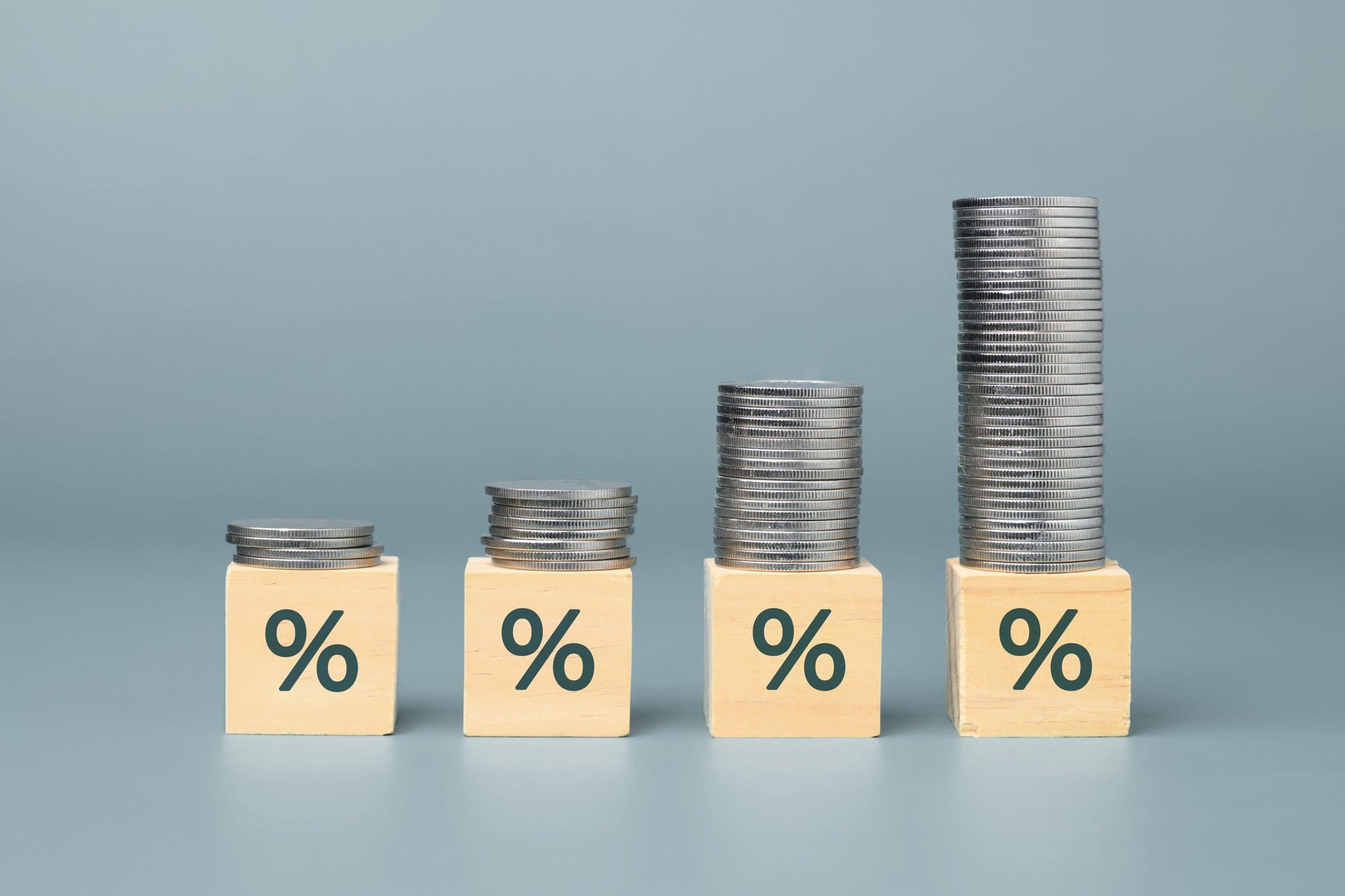 Percentage Increase Depicted with Coins and Blocks