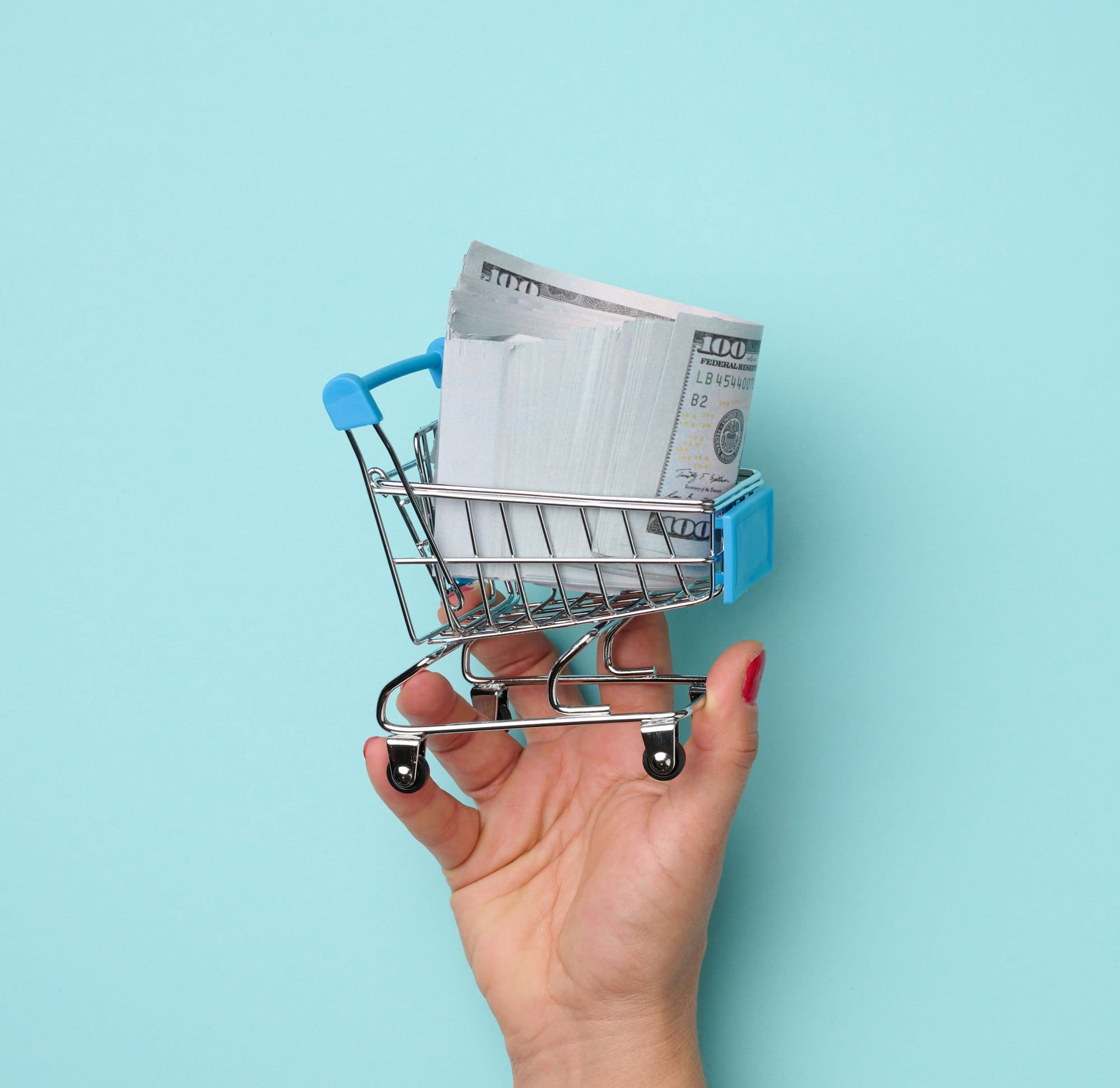 Shopping Cart Full of One Hundred Dollar Bills