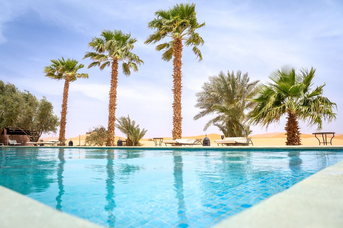 Desert oasis with a clear blue swimming pool
