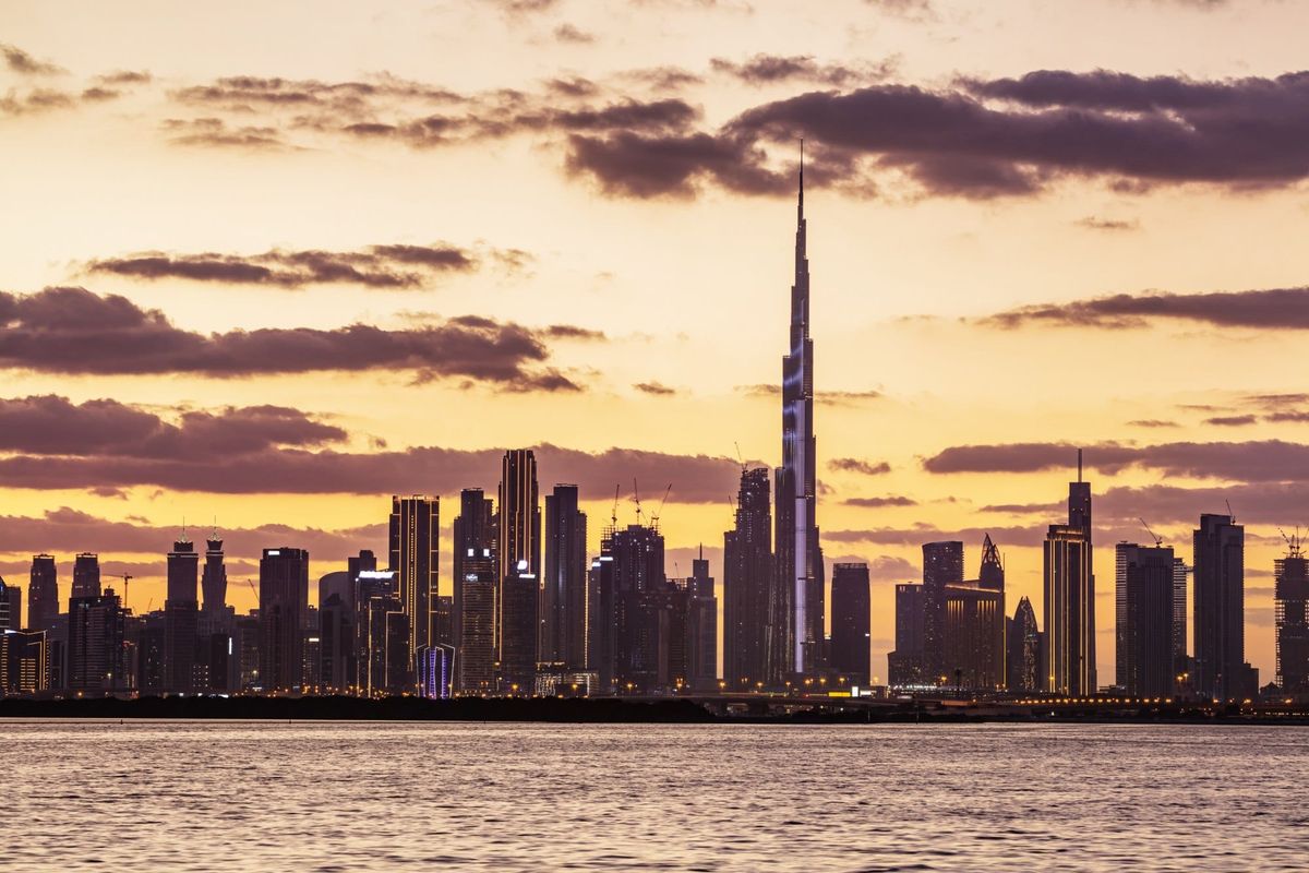 Skyscrapers skyline of Dubai UAE downtown with Burj Khalifa at sunset