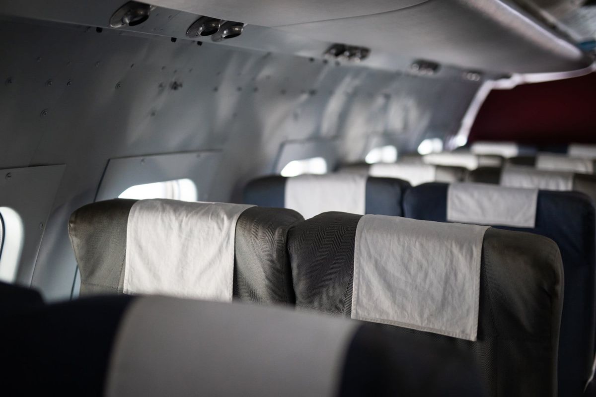 Row Interior plane seat chair window business class travel holiday explore