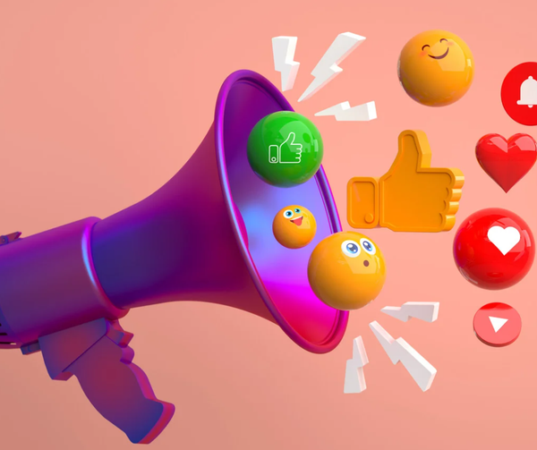 A megaphone with emoji emerging from it.