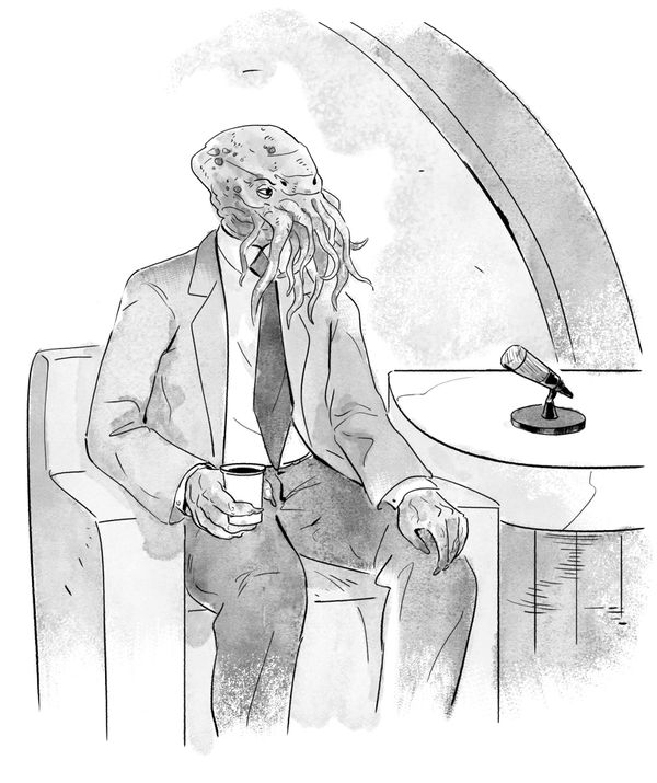 Cthulhu sitting on stage for an interview holding a cup of coffee.