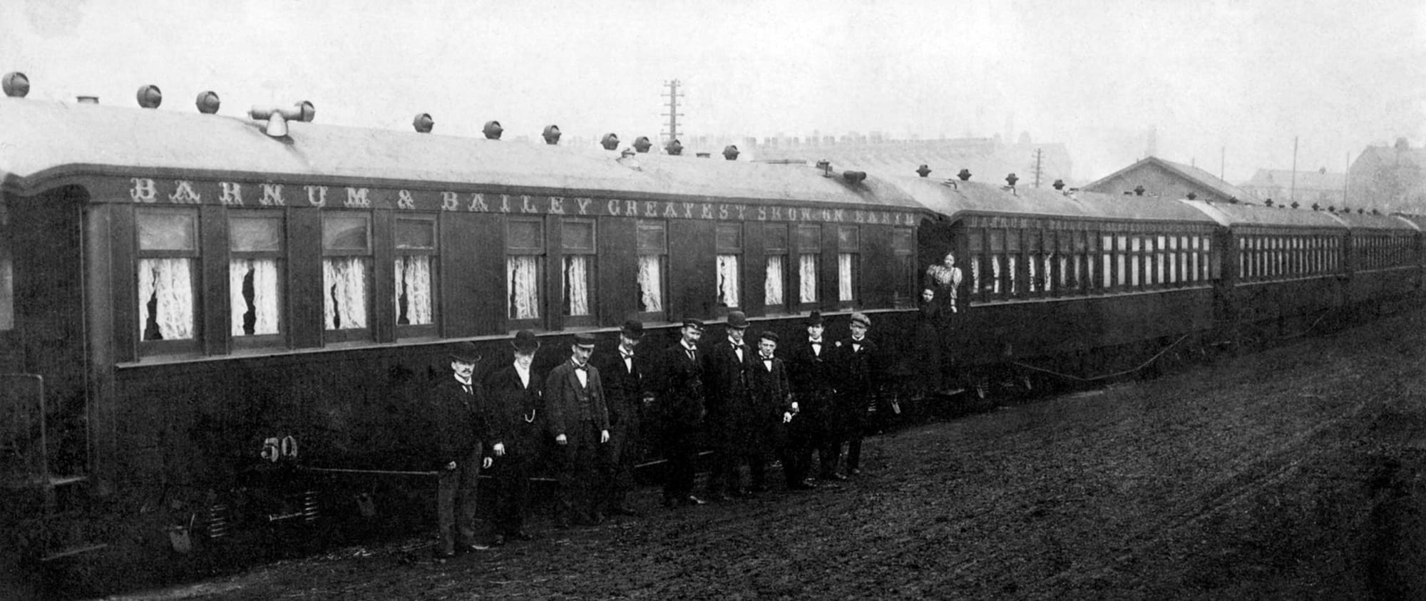 Barnum and Bailey sleeping car number 50 with circus staff