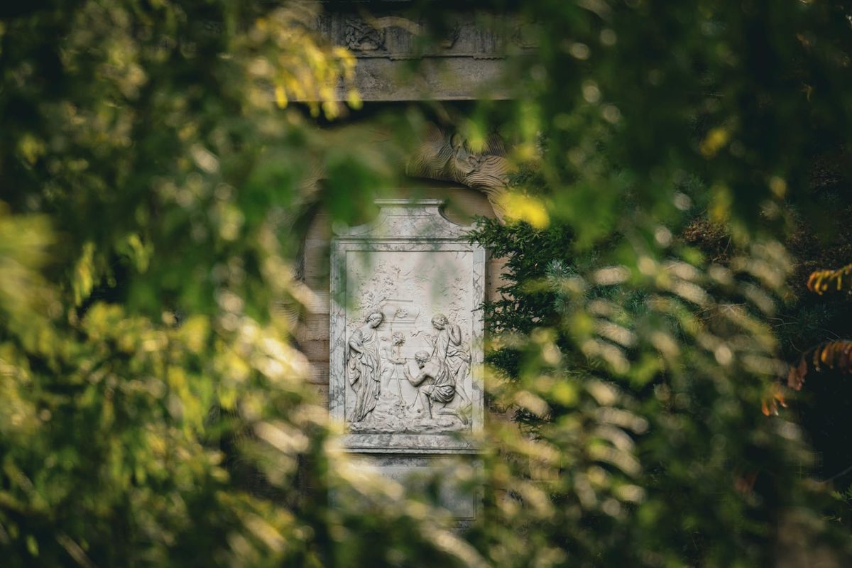 The Shepherd's Monument at Shugborough Hall, Staffordshire, glimpsed through the trees in its shaded hollow beside the River Sow. Photo: Jenna Goodwin / The Red Haired Stokie