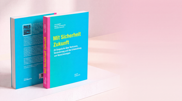 Zwei Ausgaben des neuen Buches "Mit Sicherheit Zukunft"