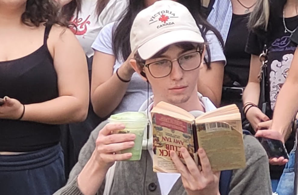 Pretending to Read Sylvia Plath at the Performative Male Contest