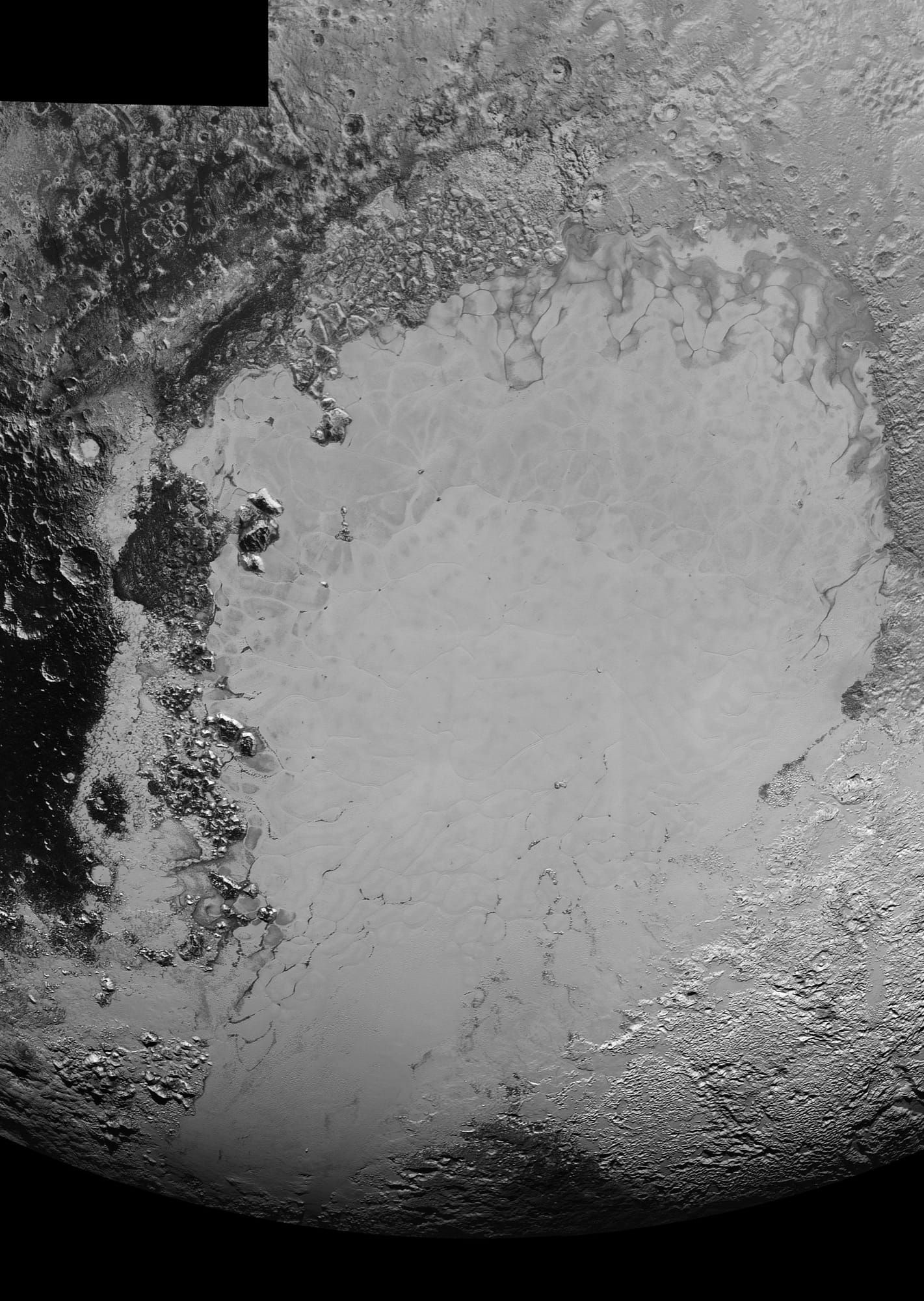 Suprafata inghetata a lui Pluto, regiunea Sputnik Planitia, fotografiata de sonda New Horizons