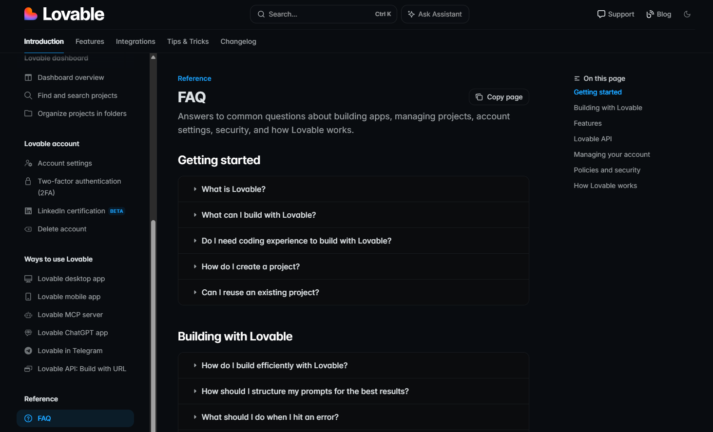 Lovable FAQ page in a dark-themed help center, showing a sidebar navigation, search bar, and accordion-style FAQ sections for getting started and building with Lovable.