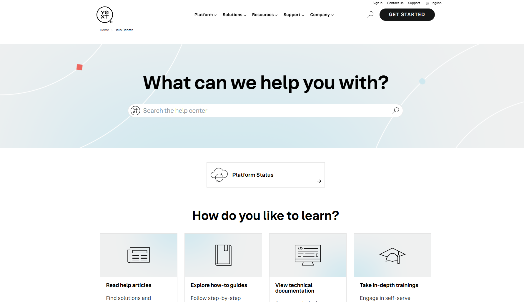 Yext’s help center homepage with a search bar, platform status link, and learning path options.