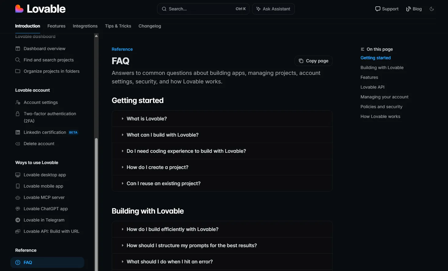 Lovable FAQ page in a dark-themed help center, showing a sidebar navigation, search bar, and accordion-style FAQ sections for getting started and building with Lovable.