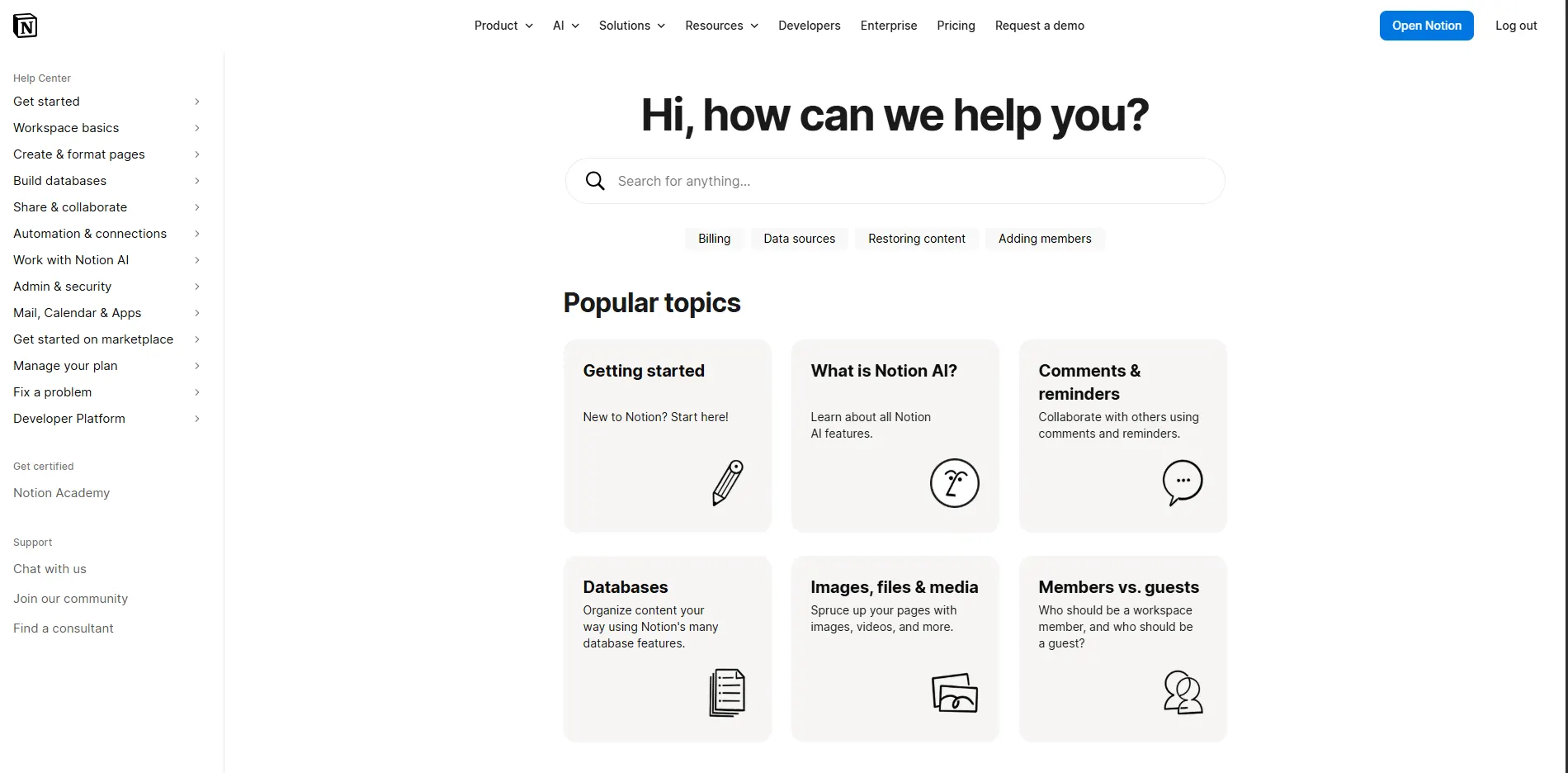 Notion Help Center page with a large search bar, suggested help topics, sidebar navigation, and popular topic cards for getting started, Notion AI, databases, and collaboration.