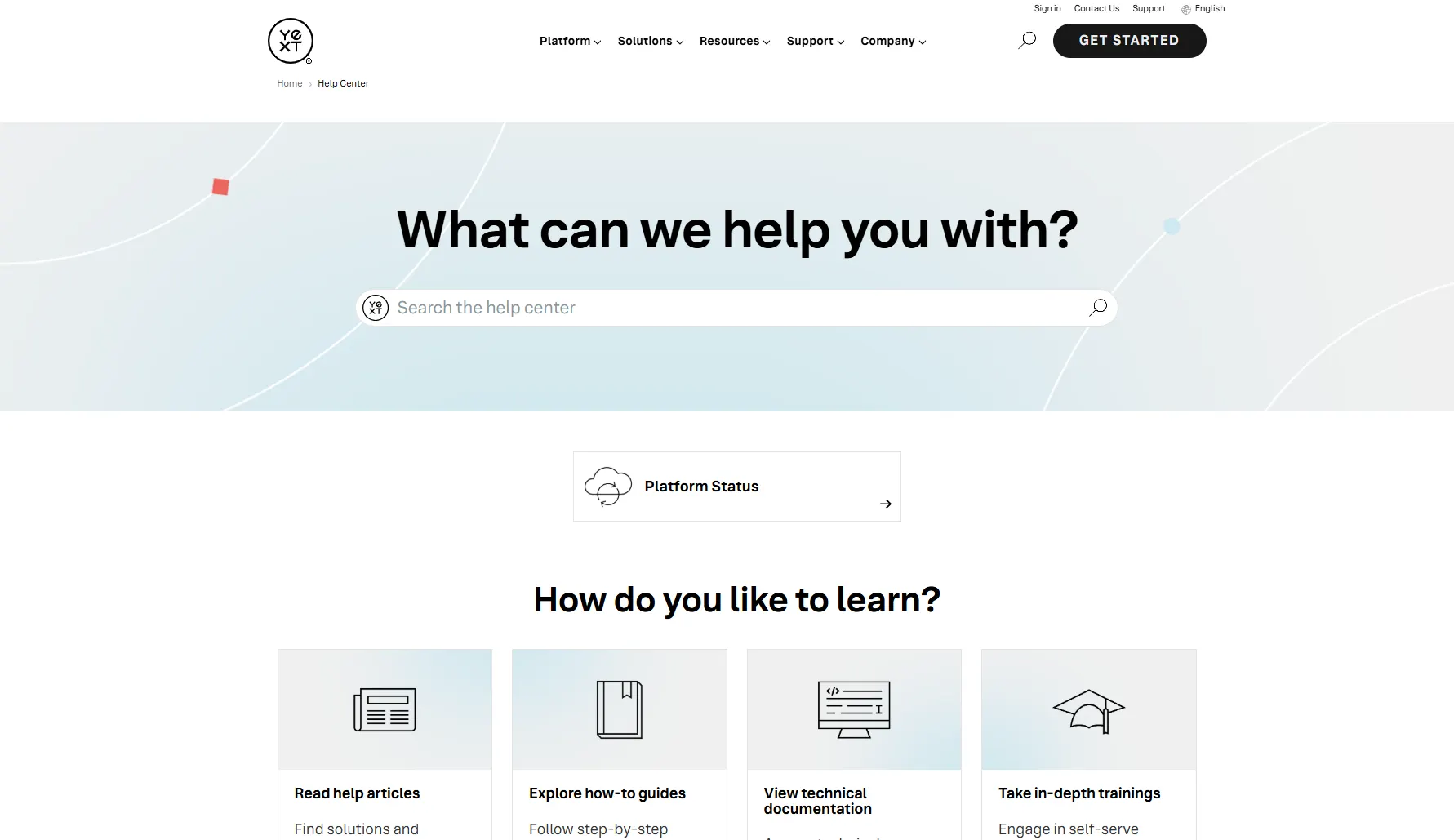 Yext’s help center homepage with a search bar, platform status link, and learning path options.