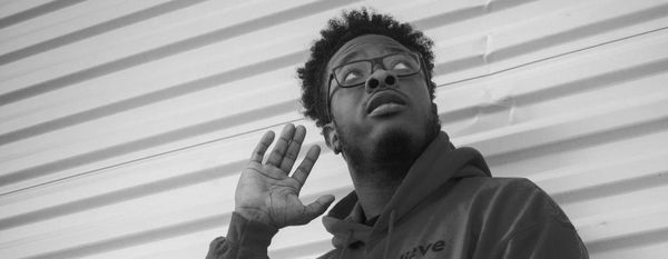 Man listening to someone speak.