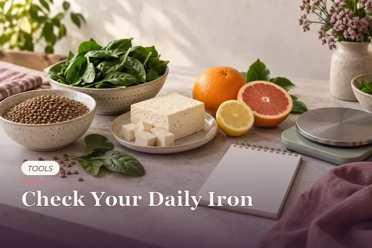 Iron-rich foods beside a blank notepad and kitchen scale.