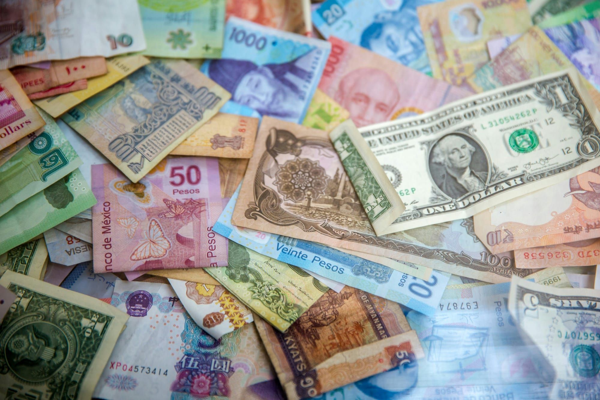 Currency and International Transfer Considerations for Expat Families Paying for Care