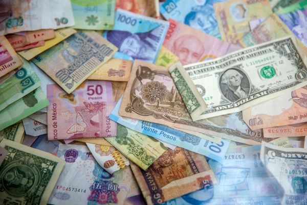 Currency and International Transfer Considerations for Expat Families Paying for Care