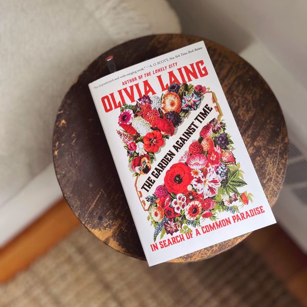 Paperback of Olivia Laing's The Garden Against Time
