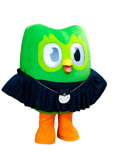Duo the green Duolingo owl mascot wearing traditional Highland dress