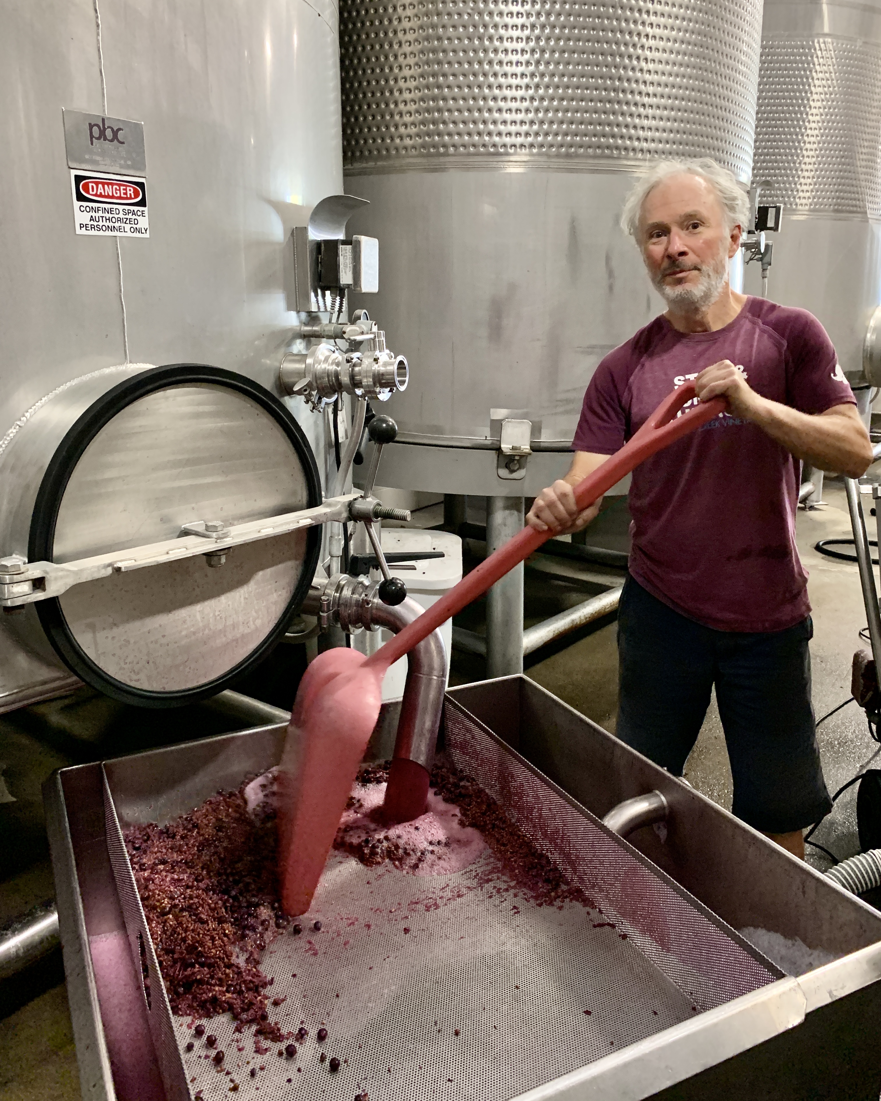Gustavo digging Syrah tanks Sept 2021