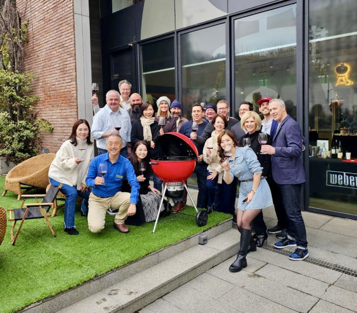 Group outside Seoul Weber Grill event
