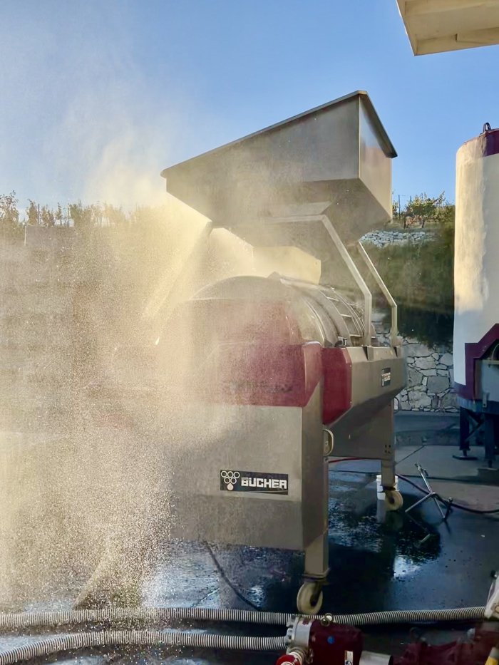 Gustavo washing the press