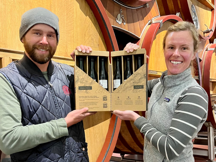 Craig Hamm and Chelsea Franchi holding MTW kit