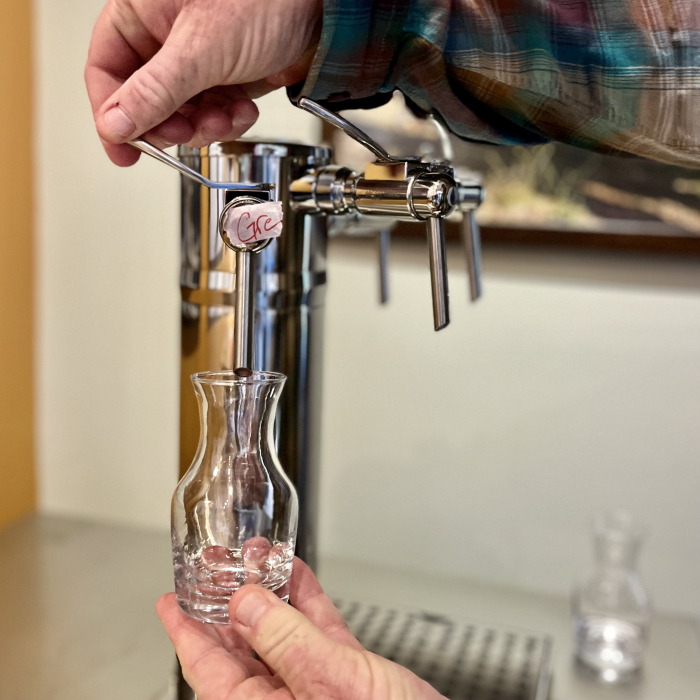 Pouring from Tap in the Tasting Room